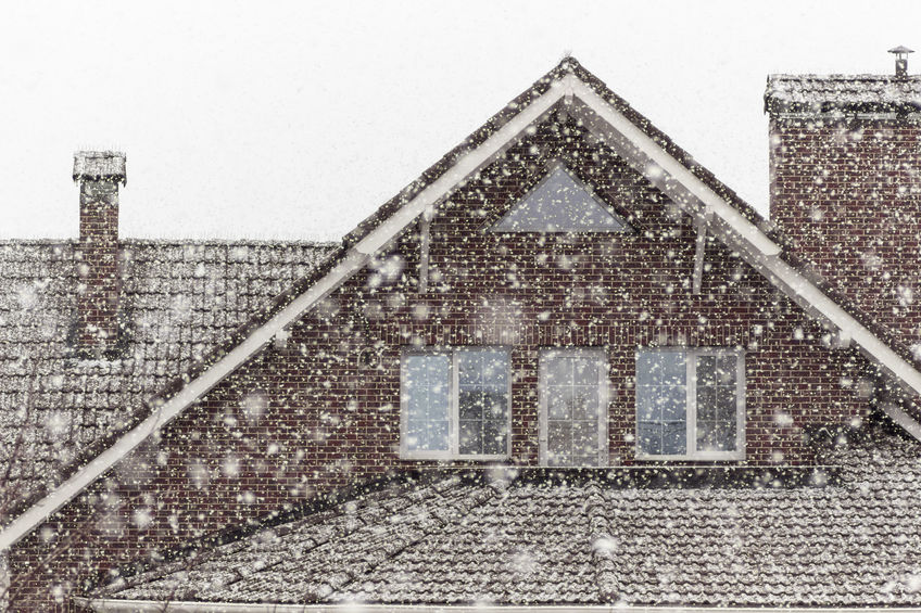 There is heavy snow outside the window.